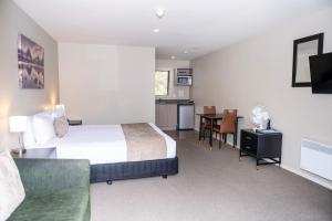 Rúm í herbergi á 58 On Cron Motel