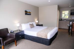 Rúm í herbergi á 58 On Cron Motel