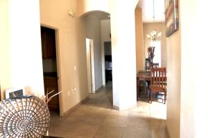a hallway of a home with a dining room at Southwestern Comfort Stay 2B in Las Cruces