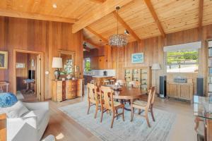 a kitchen and dining room with a table and chairs at Rosemary's Retreat in Mendocino