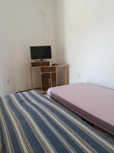 Ein Bett oder Betten in einem Zimmer der Unterkunft Hotel Pousada Stephanne