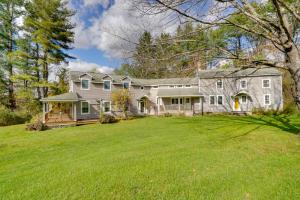 a large gray house with a large yard at Historic New Lebanon Hideaway on 33 Private Acres! in New Lebanon