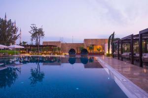 Bazén v ubytování Adana HiltonSA Hotel nebo v jeho okolí