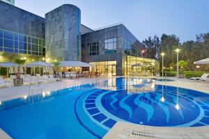 Bazén v ubytování Adana HiltonSA Hotel nebo v jeho okolí