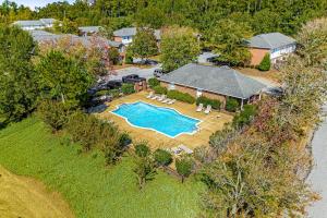 an aerial view of a house with a swimming pool at Tranquil Townhome in Auburn