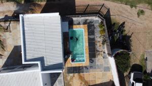 an overhead view of a swimming pool on a building at Pousada Lua Branca in Tutóia +32 photos