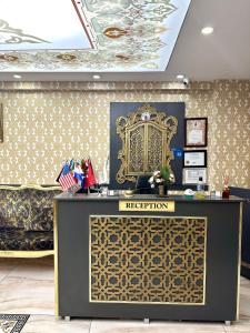 a reception desk in a room with a ceiling at WHITEMOON HOTEL SUİTES in Istanbul