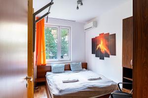 Posteľ alebo postele v izbe v ubytovaní Zoe apartman