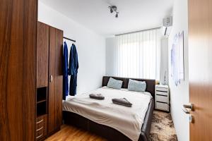 Posteľ alebo postele v izbe v ubytovaní Zoe apartman