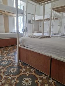 Postel nebo postele na pokoji v ubytování Hostel On