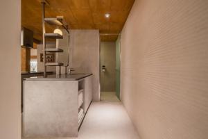 a kitchen with a counter and a sink in a room at Luxury hanok with private bathtub - SN06 in Seoul