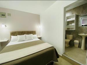 Postel nebo postele na pokoji v ubytování Casa Gaviota Dorada