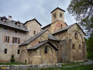 an old stone church with a tower on top of it at Maisonnette avec terrasse et vue imprenable in Théus