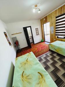 Postel nebo postele na pokoji v ubytování Guest House KAGAN