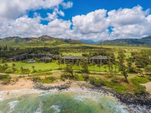 an aerial view of the resort with the ocean at Kaha Lani 304 in Lihue