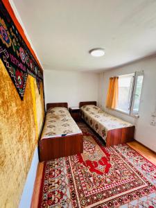Postel nebo postele na pokoji v ubytování Guest House KAGAN