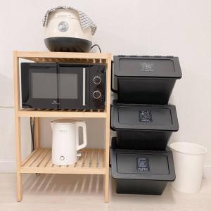 a microwave and other appliances on a shelf at Reve Guwol in Incheon