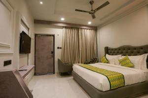 Voodi või voodid majutusasutuse Bageecha Resort toas