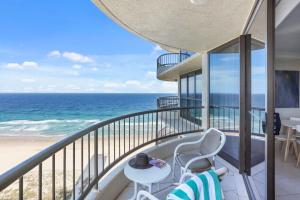 a balcony with a view of the ocean at Boulevard North Holiday Apartments in Gold Coast
