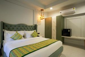 Voodi või voodid majutusasutuse Bageecha Resort toas