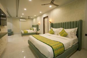 Voodi või voodid majutusasutuse Bageecha Resort toas