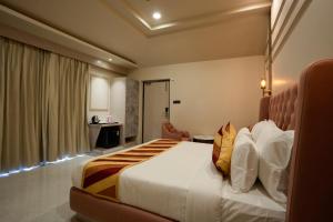 Voodi või voodid majutusasutuse Bageecha Resort toas