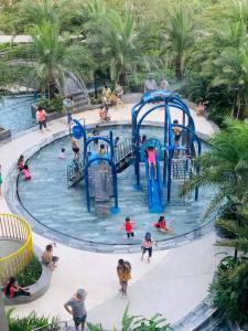 a group of people playing in a water park at The Sóng Vũng Tàu - Bin's House in Vung Tau