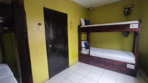 Letto o letti in una camera di Dreamkapture Hostel close to the airport and bus terminal
