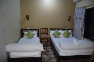 Postel nebo postele na pokoji v ubytování Hotel Garangja