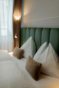 Łóżko lub łóżka w pokoju w obiekcie NED Hotel