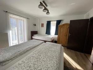 Posteľ alebo postele v izbe v ubytovaní Haus Alpenblick Mölltal