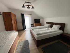 Posteľ alebo postele v izbe v ubytovaní Haus Alpenblick Mölltal