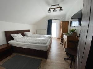 Posteľ alebo postele v izbe v ubytovaní Haus Alpenblick Mölltal