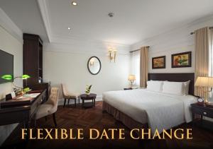 Ένα ή περισσότερα κρεβάτια σε δωμάτιο στο Silk Path Boutique Hanoi