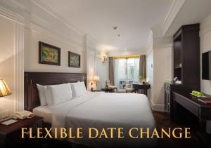 Ένα ή περισσότερα κρεβάτια σε δωμάτιο στο Silk Path Boutique Hanoi