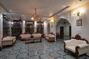 Voodi või voodid majutusasutuse Bageecha Resort toas