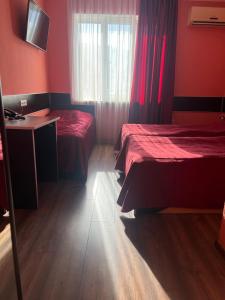 Letto o letti in una camera di Autopapa
