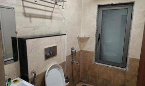 Koupelna v ubytování FabHotel Prime Shree Dev Prime