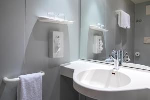 Koupelna v ubytování Roomingtons Lüneburger Heide