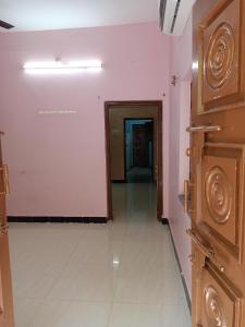 a hallway with a door and a room with a corridor at 1 BHK House with AC fully operational kitchen with wifi in Hyderabad