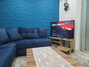 TV a/nebo společenská místnost v ubytování Dalaman Botanik Garden