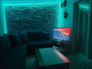 TV a/nebo společenská místnost v ubytování Dalaman Botanik Garden