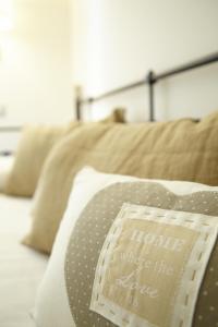 A bed or beds in a room at Affittacamere Arosio