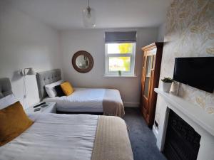 Postel nebo postele na pokoji v ubytování The Wincheap B&B