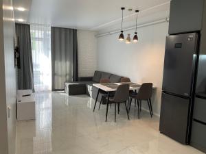 Kuchyň nebo kuchyňský kout v ubytování AVALON Apart-Hotel