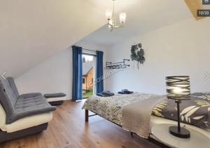 Postel nebo postele na pokoji v ubytování APARTAMENTY UL.SARNIA