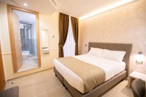 Hotel Maximus客房内的一张或多张床位