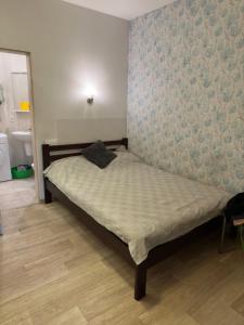Postel nebo postele na pokoji v ubytování Студия у моря Французский бульвар
