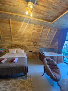Postel nebo postele na pokoji v ubytování shatobungalov suit