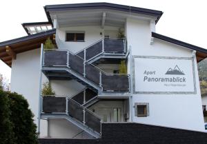 a building with stairs on the side of it at Apart Panoramablick 
